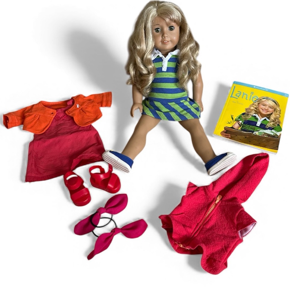 Retired American Girl 2010 Lanie with doll book and 2 outfits